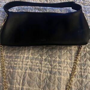 Black leather BCBGMAXAZRIA shoulder bag with gold chain strap #glamour